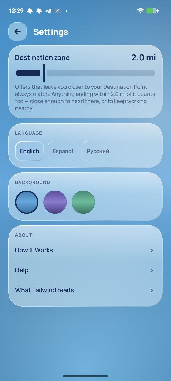 Settings: a Destination zone slider at 2.0 miles, language chips for English, Español and Русский, and three background colours.